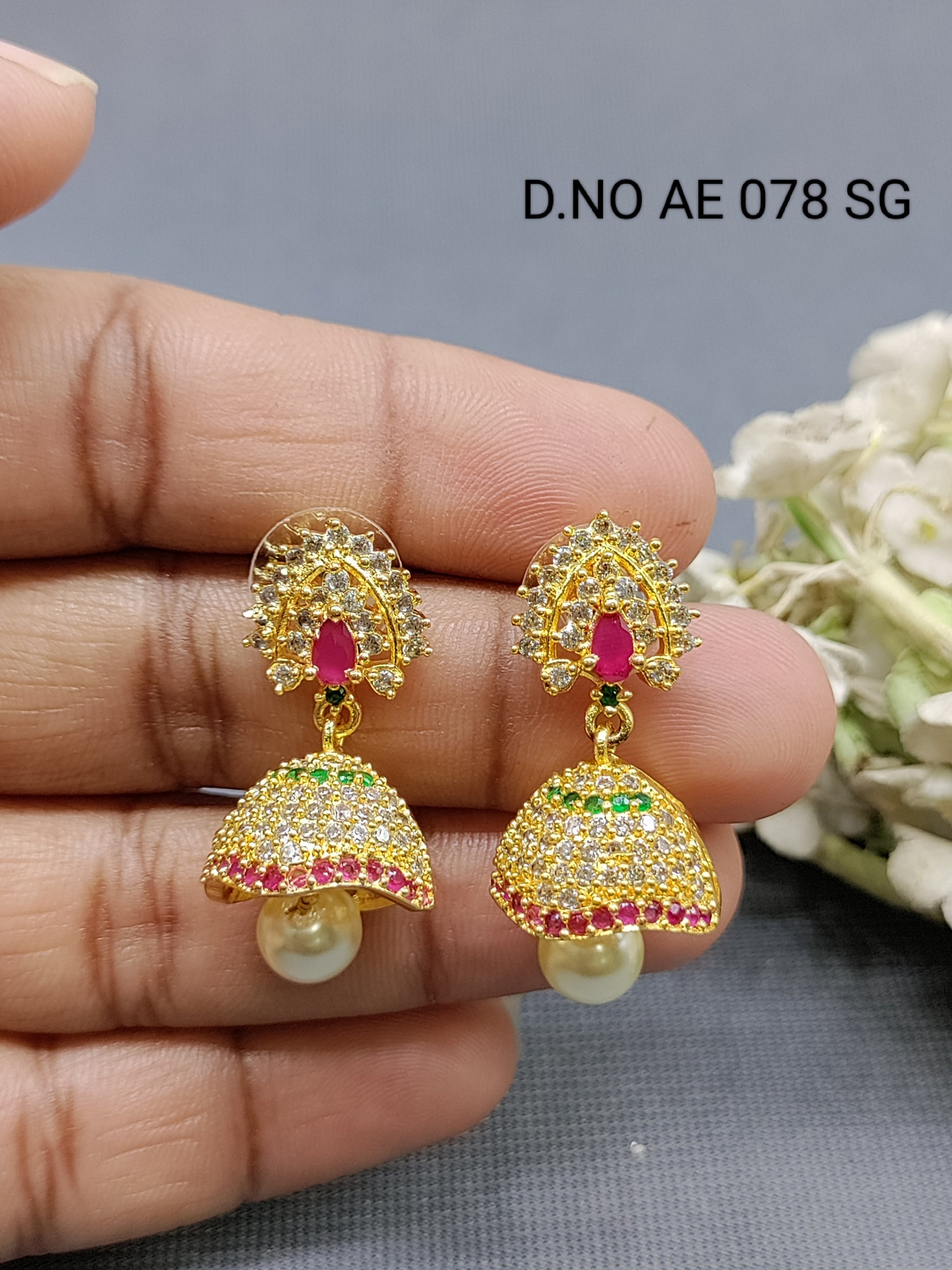 Cz ad Golden Jhumki Earring Sku AE 078 SG rchiecreation