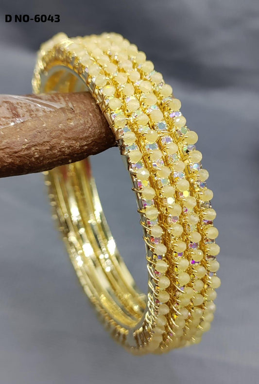 Stone Bangles Golden Yellow Sku- 6043 - rchiecreation